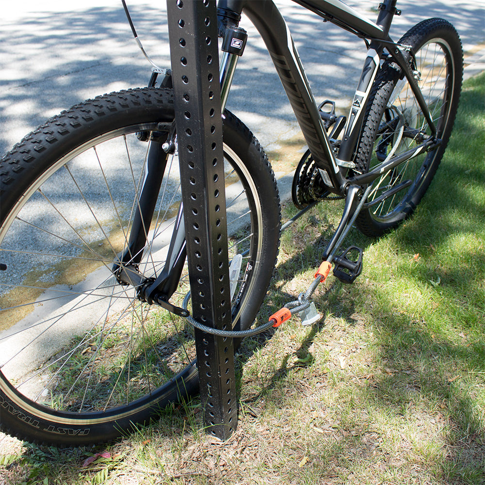 Bike Secured by Cable to Post